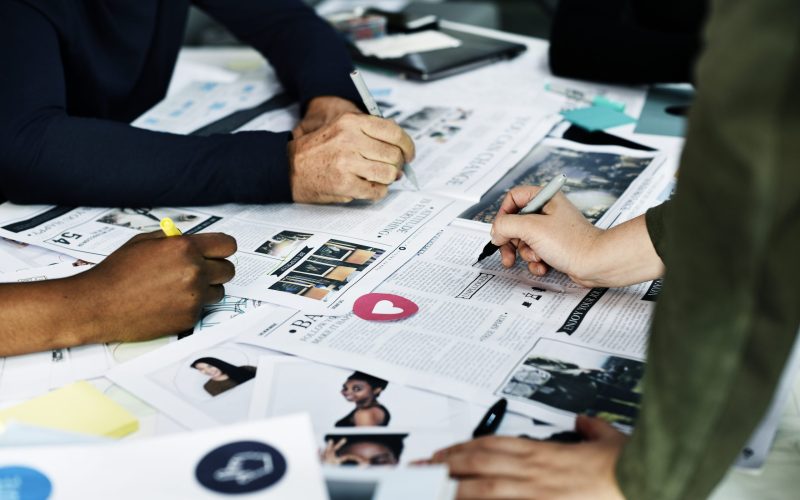 Group of diverse people brainstorming together